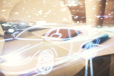 Double exposure of automobile theme sketch over cell phone background. Concept of technologyの写真素材