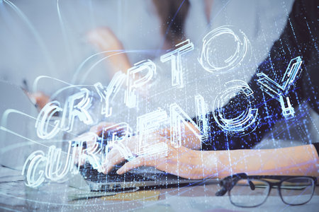 Double exposure of woman hands typing on computer and crypto market theme hologram drawing. Blockchain concept.の写真素材