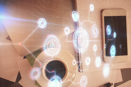 Double exposure of technology theme drawing over work table desktop. Top view. Global data analysis concept.の写真素材