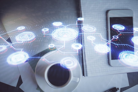 Double exposure of social network theme drawing over table with phone. Top view. People connecting concept.の写真素材