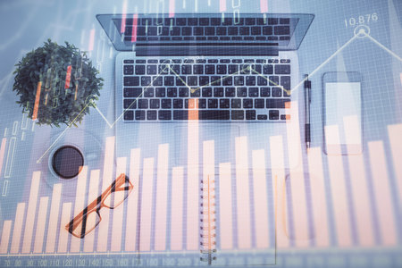 Multi exposure of forex chart drawing over table background with computer. Concept of financial research and analysis. Top view.の写真素材