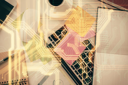 Technology hologram drawing over computer on the desktop background. Top view. Double exposure. Tech concept.の写真素材
