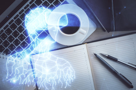 AR hologram drawings over computer on the desktop background. Top view. Multi exposure. Concept of augmented reality.の写真素材