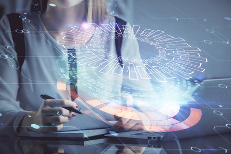 Multi exposure of woman hands working on computer and data theme hologram drawing. Tech concept.の写真素材