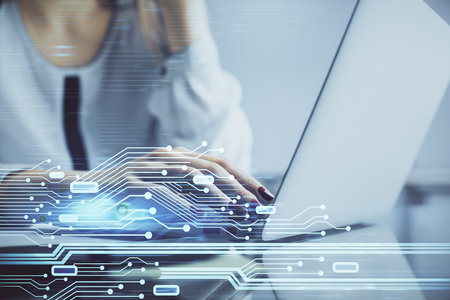 Multi exposure of woman hands working on computer and data theme hologram drawing. Tech concept.の写真素材