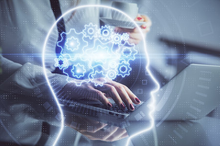 Multi exposure of woman hands working on computer and human brain hologram drawing. Ai tech concept.