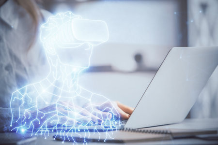 Double exposure of woman hands typing on computer and man in AR glasses drawing. Education concept.の写真素材