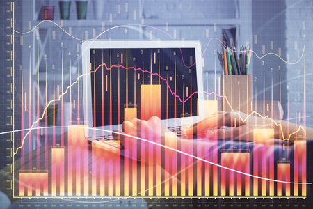 Double exposure of woman hands typing on computer and forex chart hologram drawing. Stock market invest concept.の写真素材