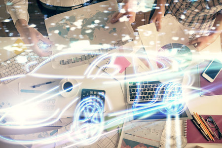 Double exposure of man and woman working together and a car drawing. Computer background. Top View. Autopilot concept.の写真素材