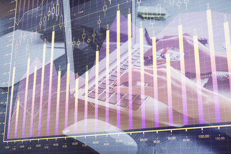 Double exposure of woman hands typing on computer and forex chart hologram drawing. Stock market invest concept.の写真素材