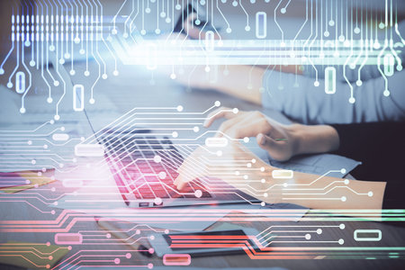 Multi exposure of woman hands working on computer and data theme hologram drawing. Tech concept.の写真素材