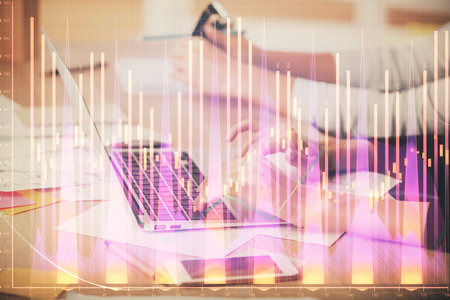 Multi exposure of woman hands typing on computer and financial chart hologram drawing. Stock market analysis concept.の写真素材