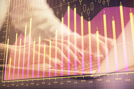 Double exposure of businesswoman hands typing on computer and forex chart hologram drawing. Financial analysis concept.の写真素材