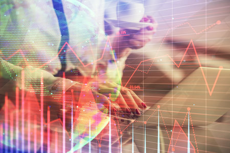 Double exposure of businesswoman hands typing on computer and financial graph hologram drawing. Stock market analysis concept.の写真素材
