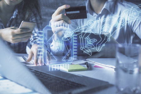 Double exposure of man and woman on-line shopping holding a credit card and data theme hologram drawing. Ai and E-commerce pay on-line concept.の写真素材