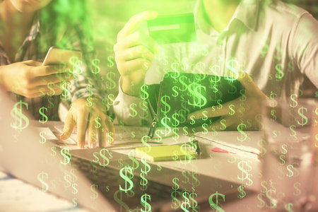 Double exposure of man and woman on-line shopping holding a credit card and forex graph hologram drawing. Stock market E-commerce pay on-line concept.の写真素材