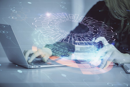 Double exposure of woman on-line shopping holding a credit card and data theme hologram drawing. E-commerce concept.の写真素材