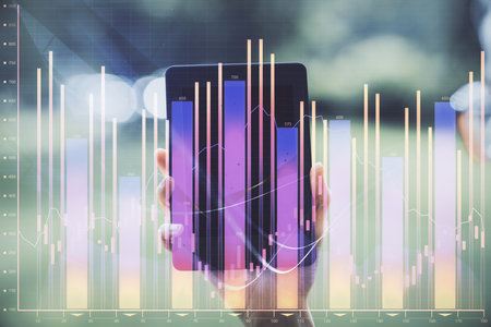 Double exposure of forex chart sketch hologram and woman holding and using a mobile device. Financial market concept.の写真素材