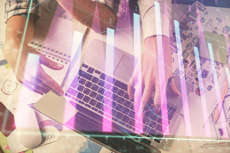 Double exposure of man and woman working together and forex graph hologram drawing. Financial analysis concept. Computer background. Top View.の写真素材