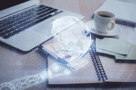 Double exposure of map drawing and desktop with coffee and items on table background. Concept of global data.の写真素材
