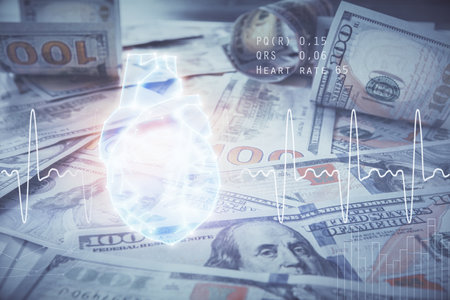 Double exposure of heart drawing over usa dollars bill background. Concept of medical education.の写真素材
