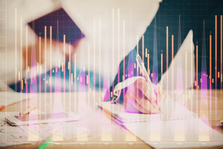 Double exposure of forex chart drawing over people taking notes background. Concept of financial analysisの写真素材