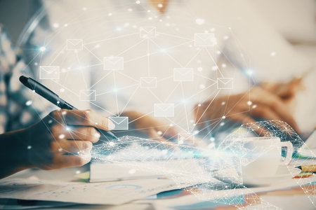 Double exposure of envelop drawing over people taking notes background. Concept of electronic connectionの写真素材