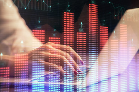Double exposure of businesswoman hands typing on computer and forex chart hologram drawing. Financial analysis concept.の写真素材