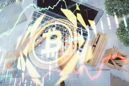 Double exposure of woman hands working on computer and blockchain theme hologram drawing. Top View. bitcoin cryptocurrency concept.の写真素材