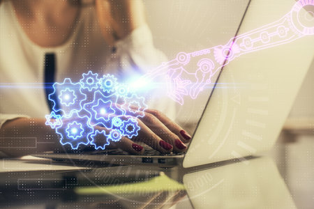 Multi exposure of woman hands working on computer and data theme hologram drawing. Tech concept.の写真素材