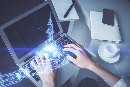 Double exposure of woman hands typing on computer and creative drawing. Start up concept.の写真素材