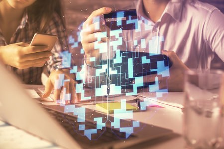 Double exposure of man and woman on-line shopping holding a credit card and data theme hologram...