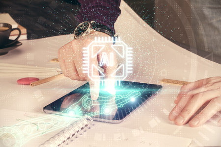 Double exposure of man's hand holding and using a digital device and data theme drawing. Technology concept.の写真素材