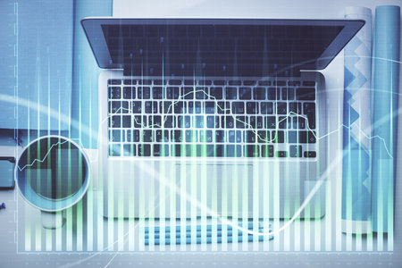 Double exposure of forex graph drawing over desktop background with computer. Concept of financial analysis. Top view.の写真素材