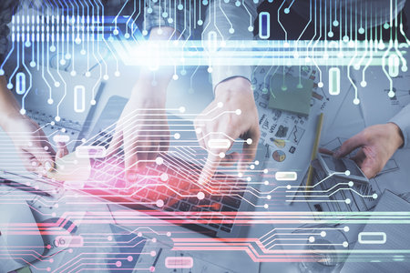 Double exposure of man and woman working together and data theme hologram drawing. Computer background. Top View.の写真素材