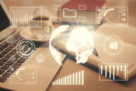 Double exposure of financial chart drawing and desktop with coffee and items on table background. Concept of forex market tradingの写真素材