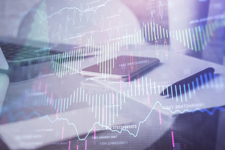 Double exposure of forex graph drawing and cell phone background. Concept of financial data analysisの写真素材