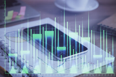 Double exposure of forex chart drawing and cell phone background. Concept of financial data analysisの写真素材
