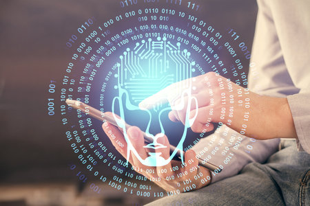 Double exposure of man's hand holding and using a digital device and brain hologram drawing. Data...