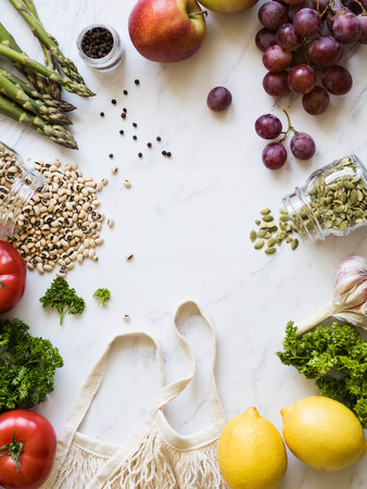Various fresh food frame on white marbleの写真素材