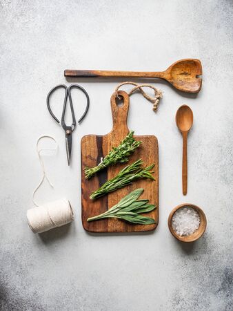Fresh raw Herbs and wood kitchen were frame on grey background. top view, copy space.の写真素材