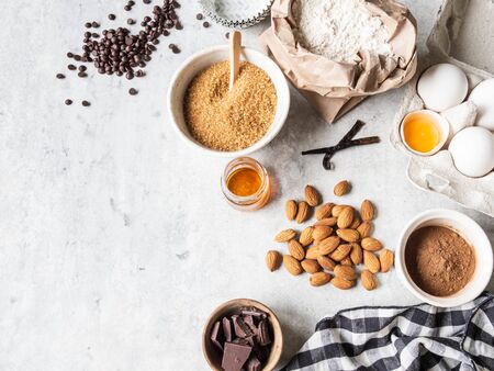 Cooking flat lay of various food ingredients for baking on white background. Copy space. Top view. Baking concept. Mockup.の写真素材