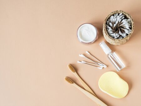 Various items for the care of women's skin on beige background. Top view. Copy spaceの写真素材