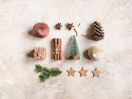Flat lay Christmas composition on brown background. top view