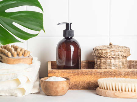 Brown bottle mockup for cosmetic products and various bath care accessories. Front view. copy space. Flat lay. cosmetics product mock up.の写真素材