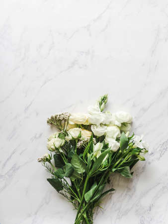Bouquet of various white flowers borderの写真素材