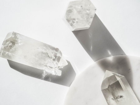 Collection natural crystals quartz on white background. Top view. Copy spaceの写真素材