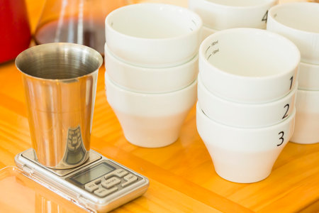 Coffee cupping cup and scaleの写真素材