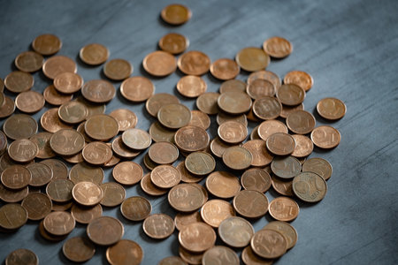 Heap of euro cents coins on metal surface. Money saving conceptの写真素材