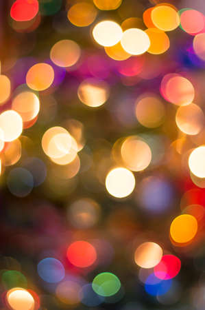 Colorful defocused christmass tree lights backgroundの写真素材
